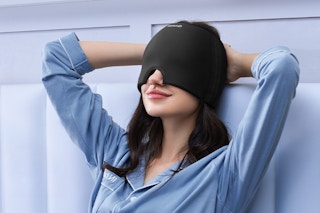 Woman wearing migraine relief cap. B0CQXMWQH9