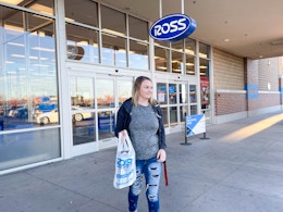 woman walking out of ross