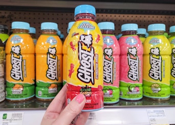 hand holding ghost hydration drink at kroger