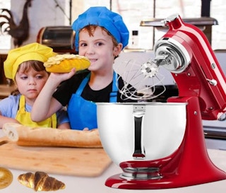 a red Kitchenaid mixer on a counter with kids making pastries