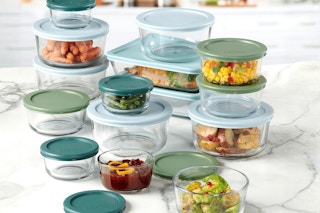 glass food storage and lids on marble countertop
