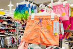 toddler swim trunks sitting on a target shelf