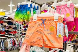 toddler swim trunks sitting on a target shelf