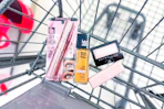 maybelline mascara, foundation, lipstick, and eyeshadow in a cart