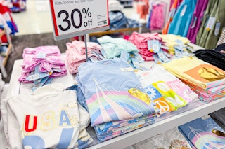 kids' graphic tees sitting on a target table