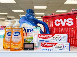 cvs shopping basket next to colgate, purex, dial, and maybelline products