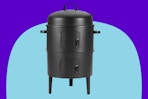  Amazon Basics 16 inch Vertical Charcoal Outdoor Smoker on a blue background.
