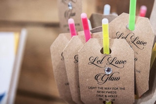 Glow sticks with wedding information on them