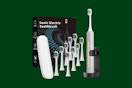 a sonic electric toothbrush on a gren background