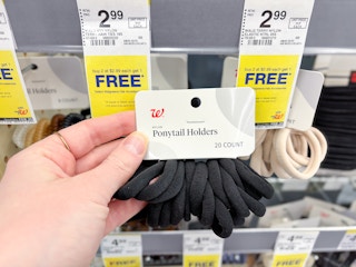hand holding walgreens ponytail holders