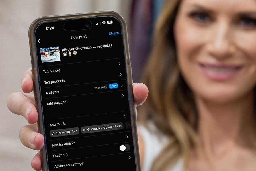 someone holding up a phone about to post their Breyers snowman treat for the sweepstakes