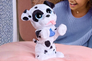 Lifestyle image of the furReal D.D. My Dancin’ Dalmatian being played with by a child 