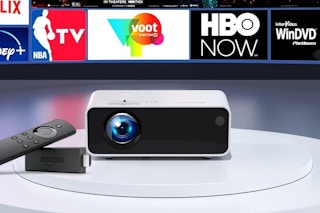 a mini movie projector in front of streaming services
