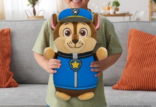child holding a 14-inch Squishmallow Paw Patrol