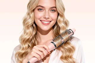 a woman using a heated round brush