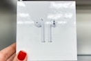 apple airpods 3rd generation with magsafe charging case in packaging handheld