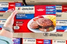 hand holding a pack of jimmy dean sausage