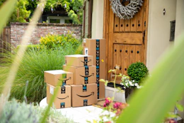 amazon boxes sitting on a front porch