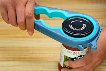 a man using a jar opener