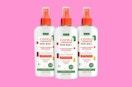 three spray bottles of hair detangler 