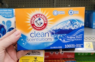 hand holding arm hammer dryer sheets at dollar general