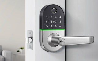 a fingerprint door lock on a door