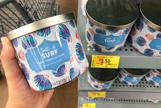 mainstays salt and surf soy candles on walmart shelf with clearance tags one candle jar held up