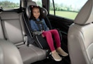 child sitting in a Safety 1st car seat in the back seat of a vehicle