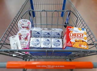 Pure Protein Crackers, Klondike Zero Sugar, Bic Razors, and Almay Concealer in Walmart shopping cart