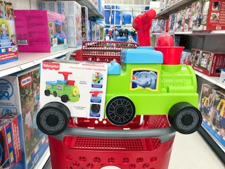 fisher-price train ride-on on a target cart