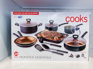 cooks cookware set on shelf
