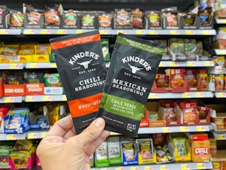 hand holding kinders seasoning at walmart