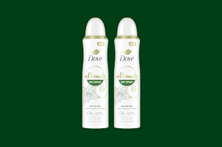 Dove dry spray on green background