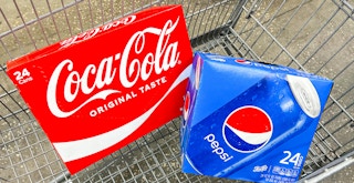 24-packs of coca cola and pepsi soda in a walmart cart