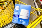febreze plug scent diffuser in a yellow shopping cart