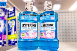 2 listerine mouthwashes on a shelf