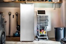 Lifestyle image of the Frigidaire 6.5 Cu. ft. Upright Freezer in garage setting