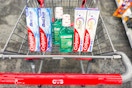 4 colgate toothpastes and 2 mouthwashes in a cart