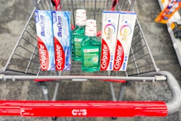 4 colgate toothpastes and 2 mouthwashes in a cart