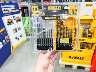 Hand holding up 14-Piece Dewalt Drill Bit Set