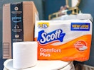 Scott Toilet Paper on a toilet next to prime box