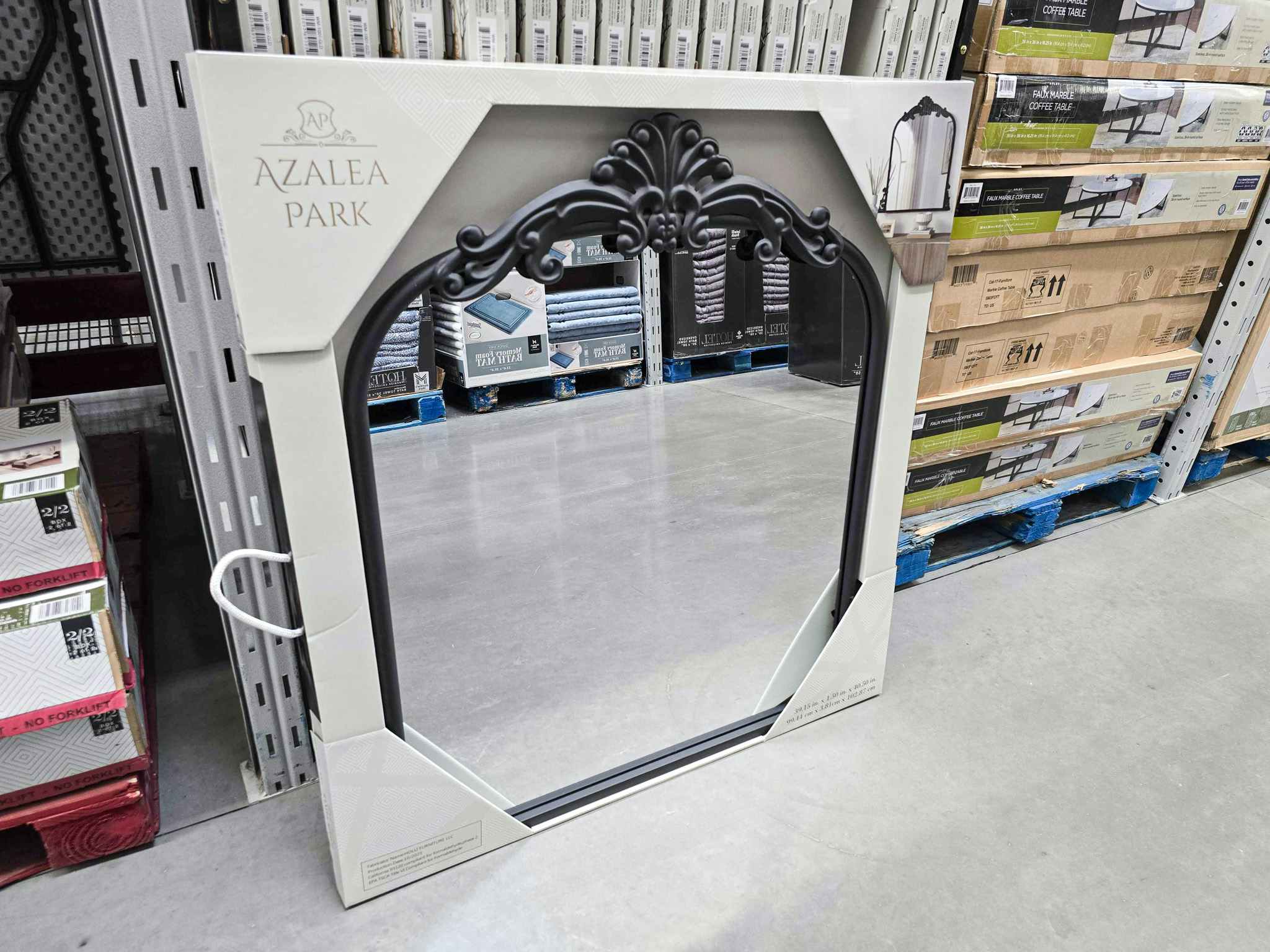 black framed mirror in a box