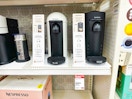 nespresso machines sitting on a target shelf