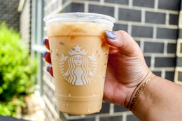 16 Starbucks Hacks to Save Big (Yes, Non-Dairy Milks Are FREE Now) card image