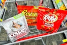 hersheys kisses, reeses, and kit kat candy in a cart