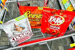 hersheys kisses, reeses, and kit kat candy in a cart