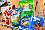 special k, ruffles, pop secret, gain flings, blue bunny in a shopping cart