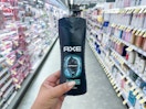 hand holding axe body wash in walgreens