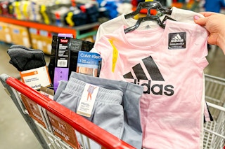 a cart of brand named clothing at costco