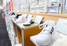 in store shoe display at DSW including Adidas Styles